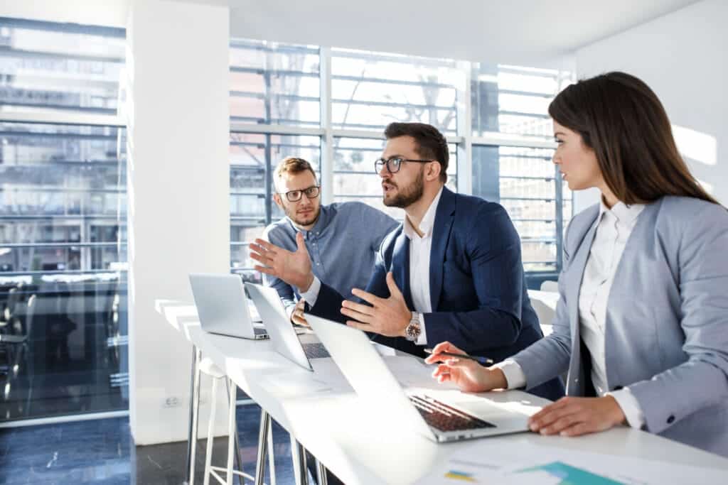 protection team meeting in an office building having a discussion