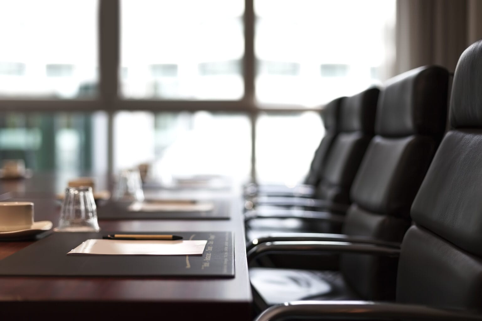 GRS Bodyguards providing Corporate Protection at an Office room staged for a meeting.