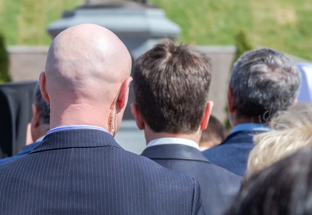 Top 5 Qualities To Look For When You Hire A Bodyguard 1 Top 5 Bodyguard hiring traits shown in agent presence.