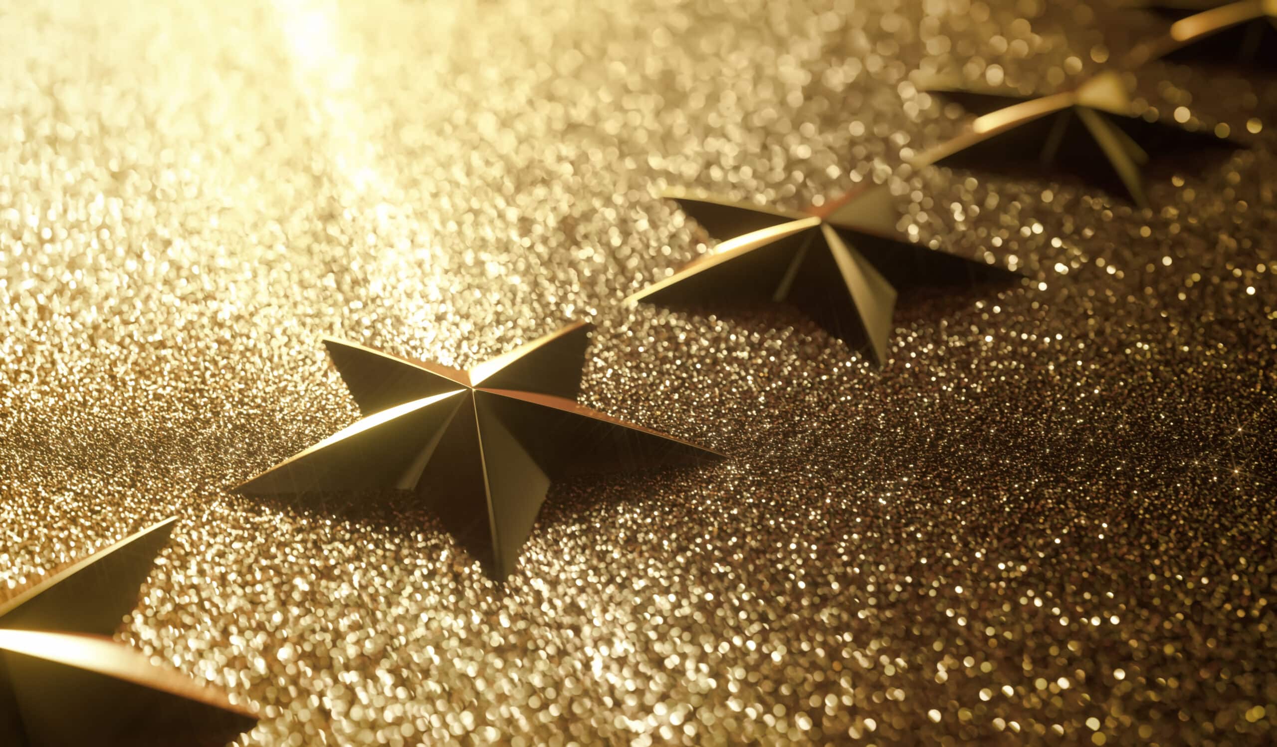 Award-style golden stars on a shimmering glitter background, symbolizing excellence in security services by Global Risk Solutions, Inc.