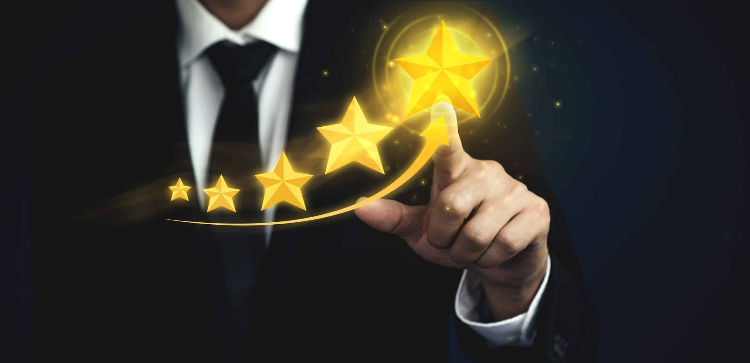 A hand interacting with glowing five-star rating graphics, representing Global Risk Solutions, Inc.'s top-rated private security services.