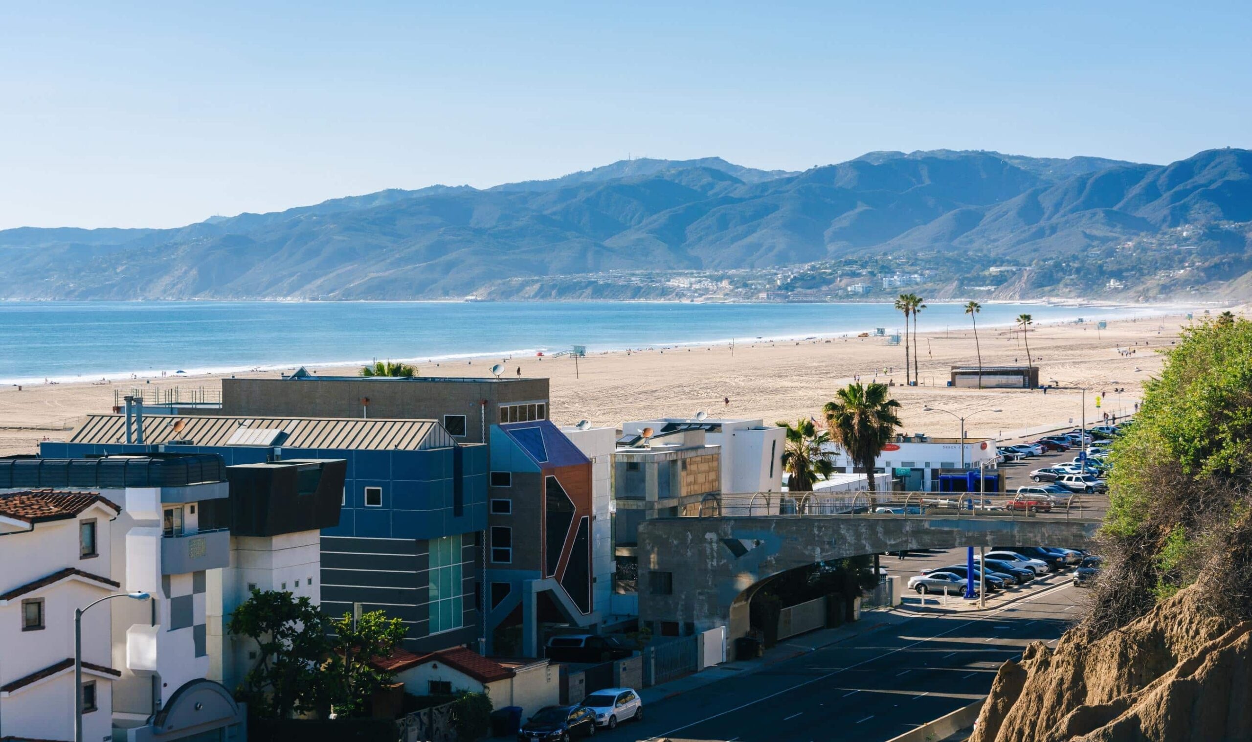 Security Services in Santa Monica illustrated through a coastal residential view highlighting oceanfront properties and elevated exposure areas.